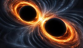 Fusão de buracos negros pode ter sido ilusão criada por lente gravitacional