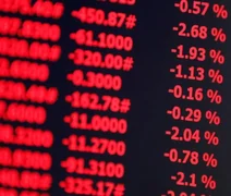 Dólar cai abaixo de R$ 5 e Bolsa dispara após 1º turno