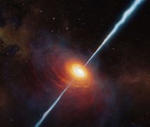Buraco negro supermassivo emite energia a distâncias recordes, revela estudo