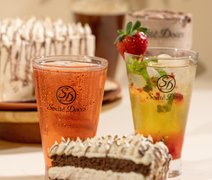 Sodiê Doces lança bolos caseiros premium e bebidas geladas zero açúcar em parceria com a Red Bull