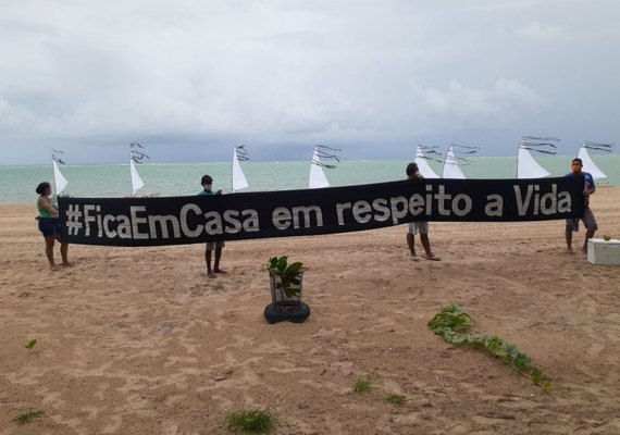 Jangadeiros fazem velório em homenagem às vítimas do Covid-19